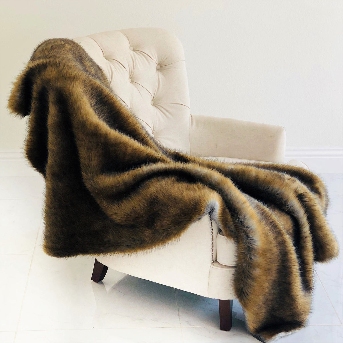 Grizzly faux fur throw in brown and gray
